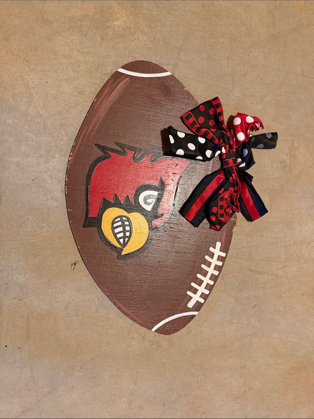 Handcrafted Football Wall Accent in Red and Brown with Ribbon Bow